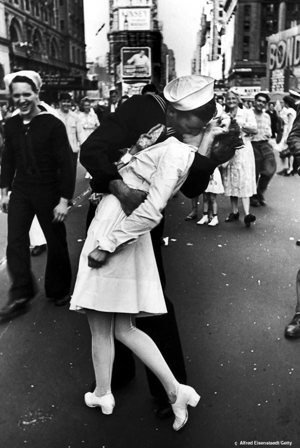 Kissing sailor